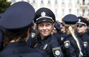 Police officers wait before an oath-taking ceremony to start up the work of a new police patrol service, part of the Interior Ministry reform initiated by Ukrainian authorities, in Kiev, Ukraine, July 4, 2015. The new service, which includes road, metro and foot patrols, is expected to replace the traffic police, widely associated with disrepute and corruption, according to local media. First 2.000 officers took an oath of allegiance to the Ukrainian people on Saturday. REUTERS/Valentyn Ogirenko